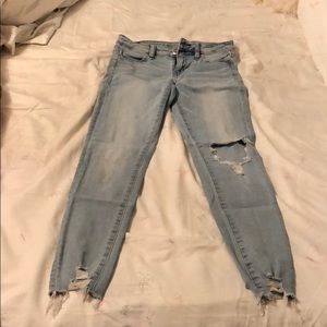 light blue ripped jeans